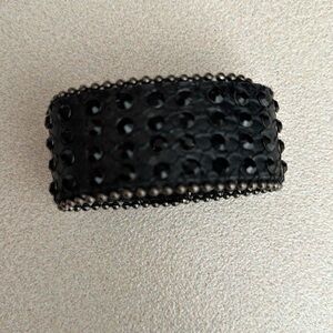 Black cuff with black stones